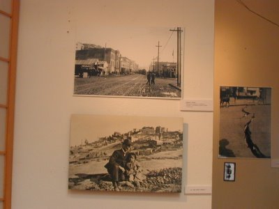 installation view of images of Broadway & Columbus, JB Monaco and cracked pavement