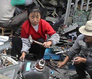 picture of Chinese woman about to smash a cathode ray tube