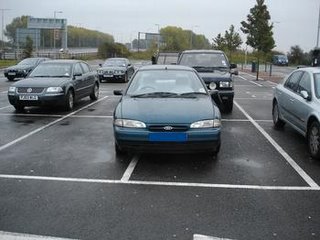 Car taking up two parking places