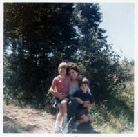 Fish catching mother with sons, near the cabin, early seventies 