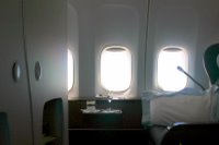 The phantom passenger at seat 1K... with my Dom Perignon!