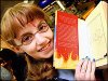 Evanna with her signed copy of Order of the Phoenix in 2003