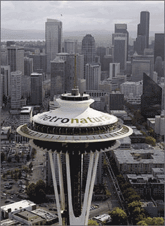 The Seattle Space Needle proudly displays the new 'Metronatural'slogan. The Seattle Tourism Board spent $120,000 to determine if it would cause helicopters and low-flying aircraft to land there.