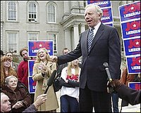 Marcia Lieberman, lower left, mother of Democratic presidential hopeful Sen. Joe Lieberman, D-Conn., watches as her son addresses a crowd of supporters at the Statehouse in Concord, N.H., in this Monday, Nov. 17, 2003 file photo.
