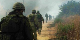 Israeli soldiers trudging Wednesday near Avivim