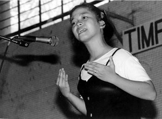 Flash usually creates harsh shadows behind your subject, destroying the mood of the picture; Rizal High school, 1996, photo by Atty. Galacio