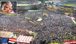 Awami League chief Sheikh Hasina, inset, addresses the grand rally of the 14-party opposition alliance at Paltan Maidan in the city yesterday