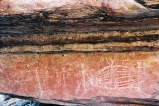 Rock art depicting a war and a fishing trap, Ubirr, Kakadu National Park