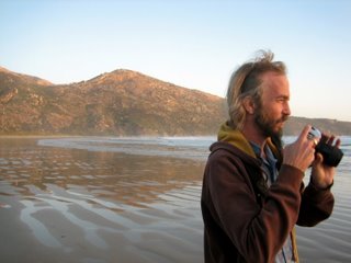 damo on the beach near the campsite at sunset