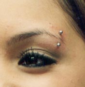 A piercing placed horizontally on the bridge of the nose, in between the eyes..  They are rarer due to associated pain, difficulty, bleeding and long healing times.  . Eyebrow piercings are one of the most common of surface piercings. For more.
