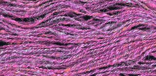 Dyed silk throwster's waste yarn.