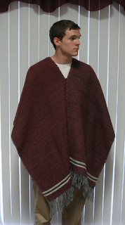 Handsome young man modeling my handspun, handwoven poncho.