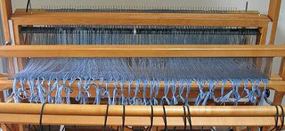 My warp is finally sleyed, all 864 end of it.