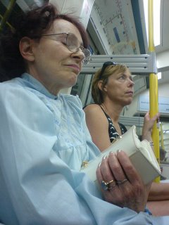 Woman sleeping on the Tube