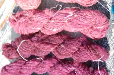 assortment of pink yarns
