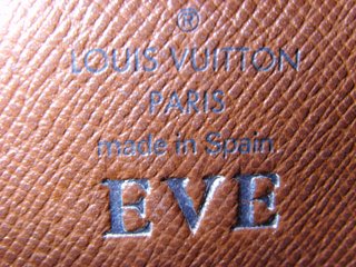 eveline's LV wallet wif her name! =/