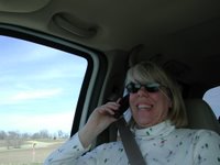 Mobile Woman gets a call somewhere on the road!