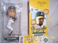 A's outfielder/switch hitter Nick Swisher left-handed bobblehead in original packaging