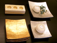 silver and golden plate