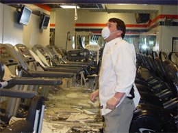 Mike Milbury inspects destroyed workout room