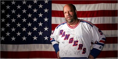 Fuzzy - Donald Cohen - wearing his Rangers jersey. It has been signed by 50 players over the years.