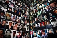 Portraits of Bosniaks, victims of the 1995 Srebrenica massacre, are displayed in the town of Tuzla. Photo: Reuters