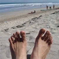 sunbathing in Kuta beach