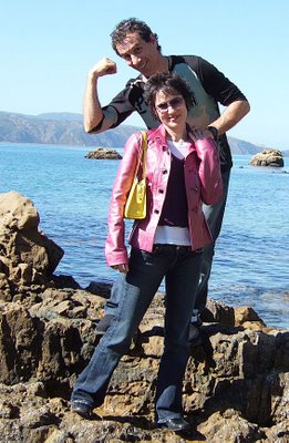 Trevor and Amiel Romain having fun on the rocks outside The Chocolate Fish Cafe, Scorching Bay, Wellington, NZ