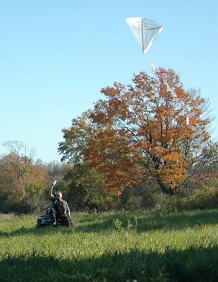 Kite aloft with aid of the quad