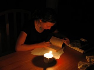 Grace studies by candlelight