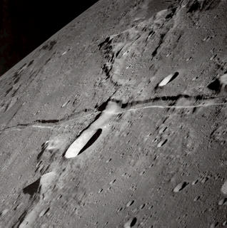 NASA Photo (It looks like a shaman on the moon to me.)