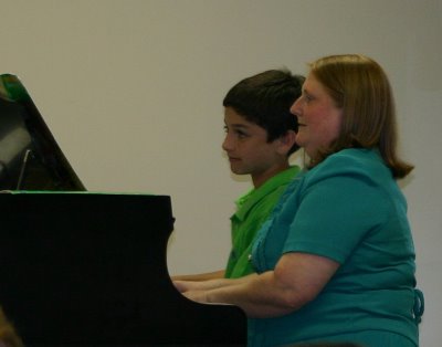 Matthew and his piano teacher