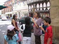 Eating ice creams outside an old tudor building in Ludlow
