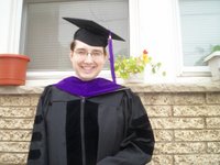 A recent graduate of Temple University Beasley School of Law wearing his purple.  5/18/2006