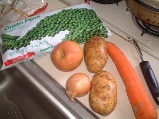 Ingredients: peas, carrots, onions, apple, and potatoes (see recipe)