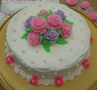 White cake with Flowers in Center