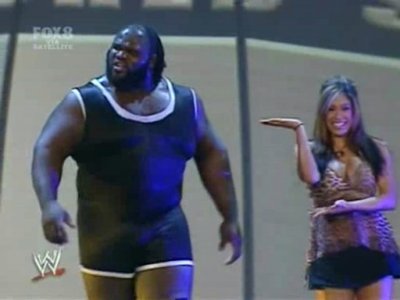 Mark Henry & Melina, on their way to the ring for Mark to face Rey Mysterio.
