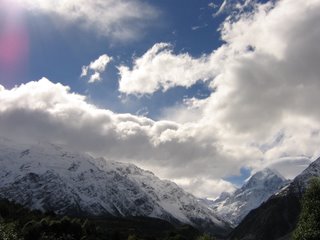 Photo by Rullsenberg: clouds over the Southern Alps, New Zealand