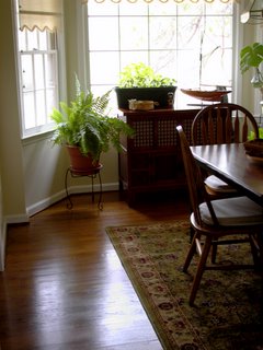 View of the dining room floor from the door to the kitchen.