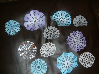 These are up on various windows throughout our house. They were cut from Origami paper, which I have tons of.