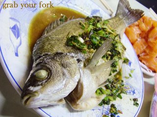 Steamed whole perch with ginger and shallots