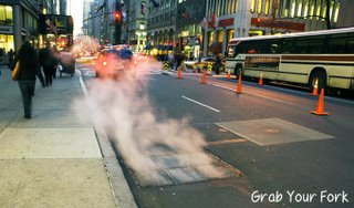 Steam rising from a drain in New York