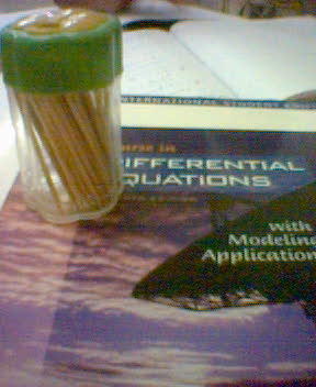 a can of toothpick and a differential equation text book