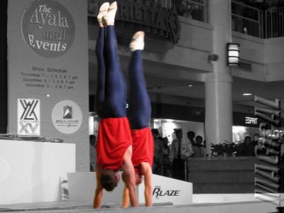 Acrobats in a hand stand