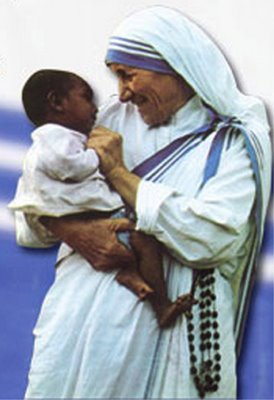 Mother Teresa carrying a baby