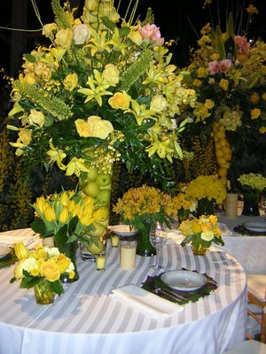 Yellow Flower Arrangement and Table Setting ...