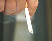 cigarette being smoked - image courtesy of freefoto