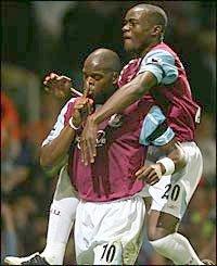 Marlon Harewood scores against Aston Villa