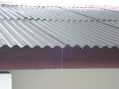 roof spewing raindrops