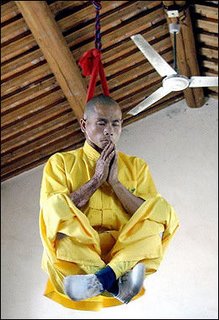 Shoalin monk practice floating with rope